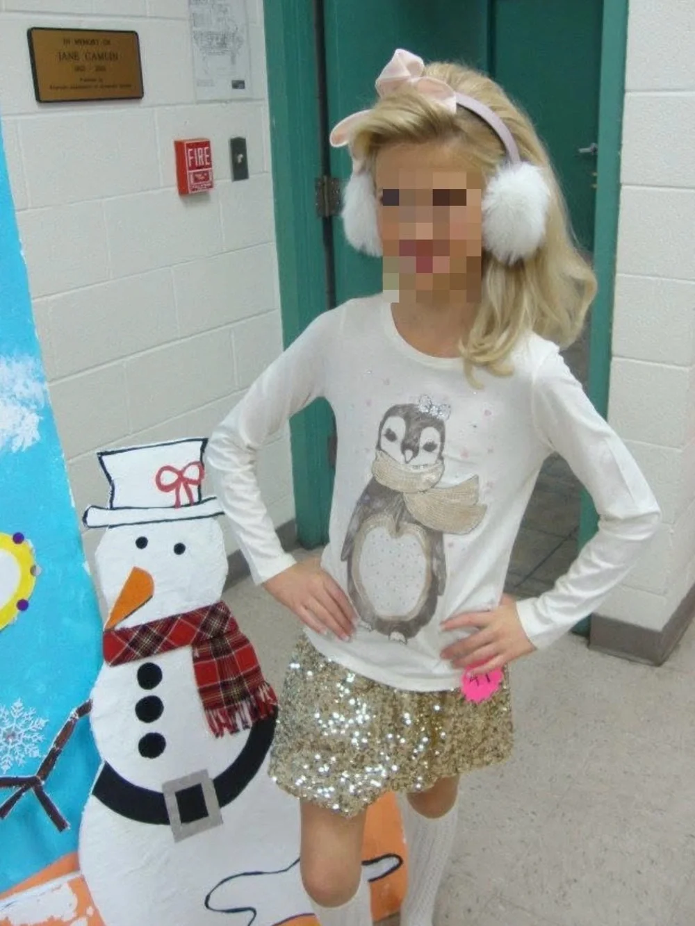 GAP Kids Cream Tee with holiday penguin paired with gold sequin skirt